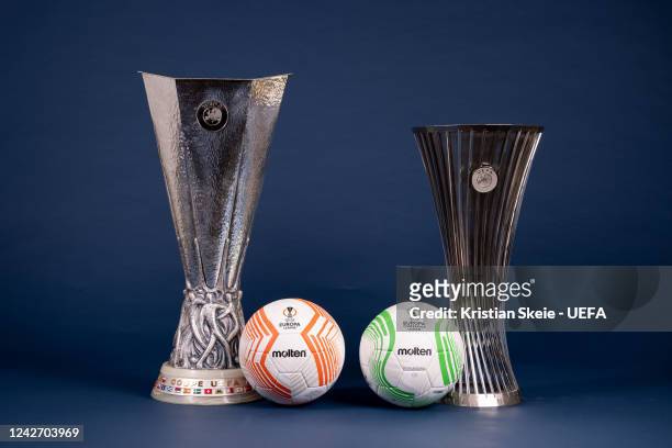 View of the UEFA Europa League and UEFA Europa Conference League 2022/23 Group Stage match balls next to the UEFA Europa League and UEFA Europa...