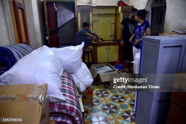 Residents of Trilok Kripa, one of the eight dilapidated buildings, vacating their houses at Borivali , on August 24, 2022 in Mumbai, India. According...