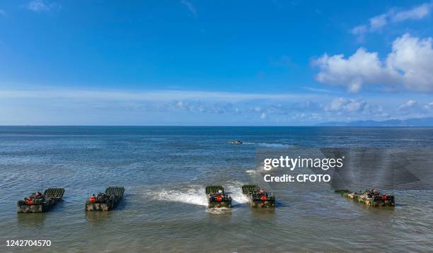 The PLA Navy and the PLA Army conduct a cross-day and all-factor live-fire red-blue confrontation drill in Zhangzhou City, Fujian Province, China,...