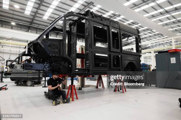 An employee works on the chassis of a prototype electric van at the Arrival Ltd. Facility in Banbury, UK, on Tuesday, Aug. 23, 2022. Arrival opened...