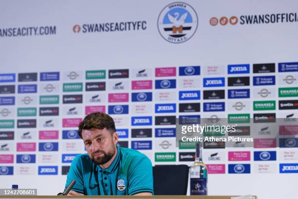 Manager Russell Martin speaks to members of the press during the Swansea City AFC Press Conference at the Swansea.com Stadium on August 25, 2022 in...
