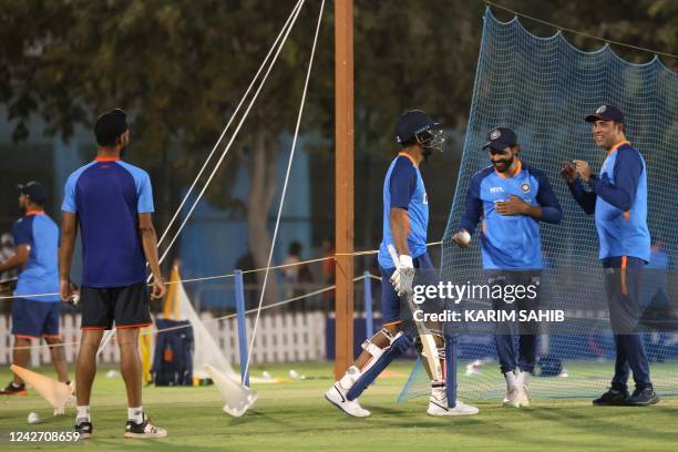 India's team members attend a practice session ahead of their cricket match against Pakistan during the Asia Cup at the ICC Academy Ground in Dubai...