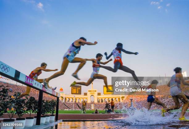 Runners in the Men's 3000 meter steeplechase final compete on August 6, 1984 during the Track and Field competition of the 1984 Olympic Games at the...