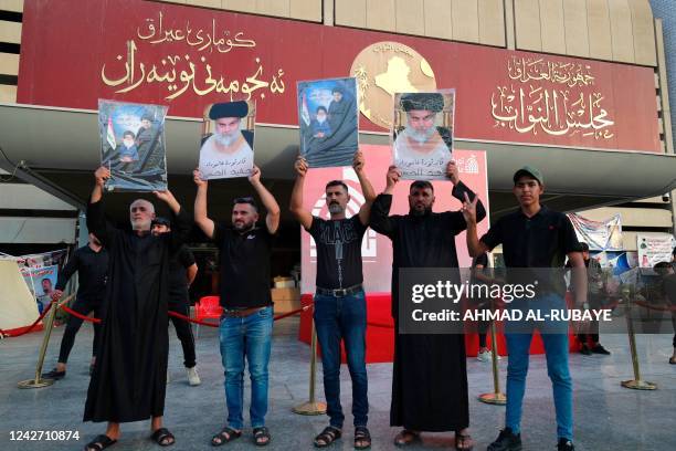 Supporters of Iraqi Shiite cleric Moqtada al-Sadr gather during a protest against the nomination of a rival Shiite faction for the position of prime...