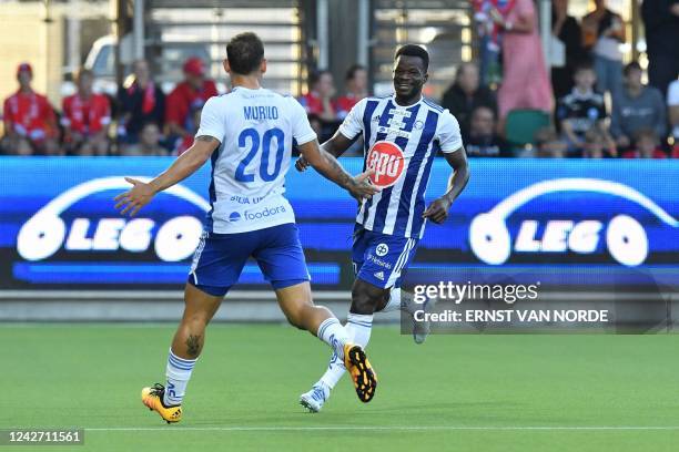 Helsinki's Ghanaian forward Malik Abubakari celebrates scoring the opening goal with his Brazialian teammate Murilo during the UEFA Europa League...