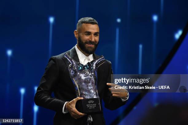 Men's Player of the Year Karim Benzema poses with their award on stage during the UEFA Champions League 2022/23 Group Stage Draw at Halic Congress...