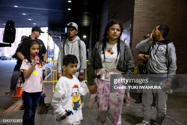 Group of migrants, who boarded a bus in Texas, arrive at Port Authority Bus Terminal in New York City on August 25, 2022. - Since April, Texas...
