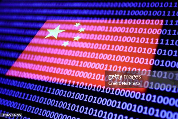 Chinese flag displayed on a phone screen and binary code displayed on a laptop screen are seen in this multiple exposure illustration photo taken in...