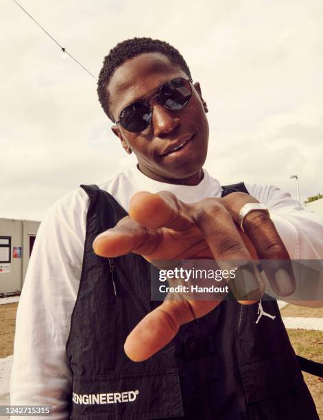 In this handout image provided by Ray-Ban, David Johnson wearing Ray-Ban poses at the Ray-Ban Studios during All Points East Festival during All...