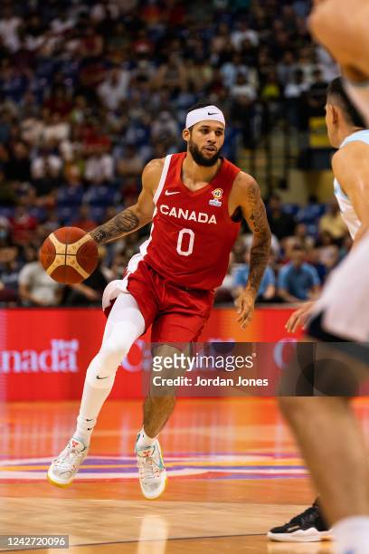 Kassius Robertson of Canada attempts to lose his defender in the game against Argentina during the Second Round of the FIBA World Cup 2023 Americas...