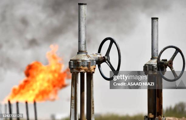 Picture shows the Nassiriya oil field in Iraq's southern Dhi Qar Governorate, on August 21, 2022. - Iraq, the second largest producer in the...