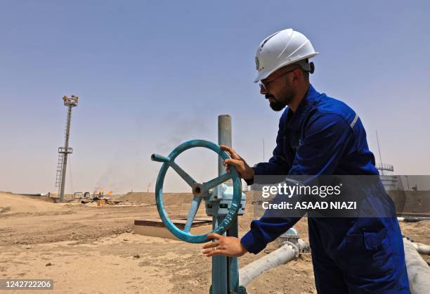 Picture shows the Nassiriya oil field in Iraq's southern Dhi Qar Governorate, on August 21, 2022. - Iraq, the second largest producer in the...