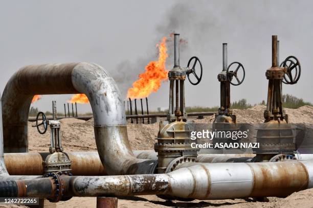 Picture shows the Nassiriya oil field in Iraq's southern Dhi Qar Governorate, on August 21, 2022. - Iraq, the second largest producer in the...