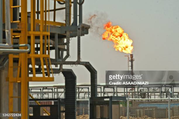 Picture shows the Al-Gharraf oil field in Iraq's southern Dhi Qar Governorate, on August 24, 2022. - Iraq, the second largest producer in the...