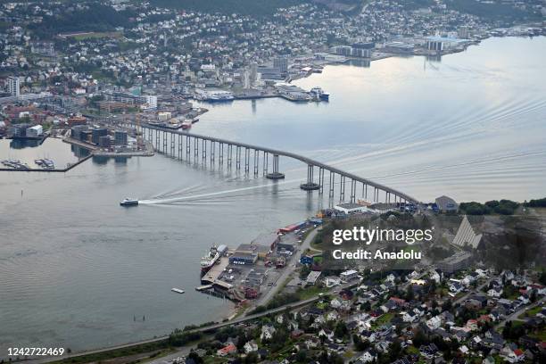 Passenger ferry sails on the fjord in Tromso, Norway, on August 16, 2022. Tromso is the northernmost city in the world with a population exceeding...
