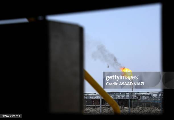 Picture shows the Al-Gharraf oil field in Iraq's southern Dhi Qar Governorate, on August 24, 2022. - Iraq, the second largest producer in the...