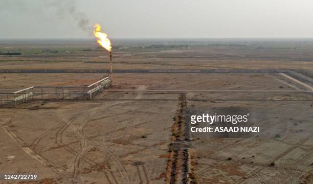 Picture shows the Al-Gharraf oil field in Iraq's southern Dhi Qar Governorate, on August 24, 2022. - Iraq, the second largest producer in the...