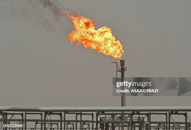 Picture shows the Al-Gharraf oil field in Iraq's southern Dhi Qar Governorate, on August 24, 2022. - Iraq, the second largest producer in the...