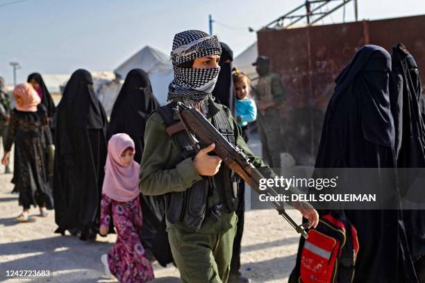 Picture shows the Kurdish-run al-Hol camp, which holds relatives of suspected Islamic State group fighters in the northeastern Hasakeh governorate,...