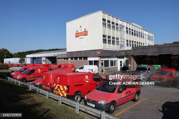 Royal Mail vehicles are parked outside the Basingstoke delivery office on August 26, 2022 during a strike over pay. - The Royal Mail Basingstoke...