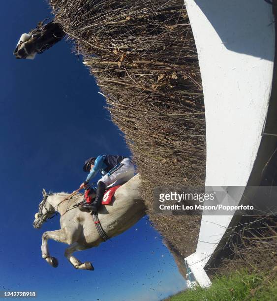 Low angle view of horses jumping a fence, taken with a remote control camera placed beneath the fence during the Starsports.bet Conditional Jockeys...