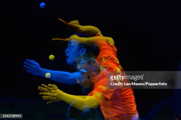 This multiple image was produced in camera. A table tennis player serving the ball during ITTF Team World Cup, Men Finals, on February 24th 2018 in...