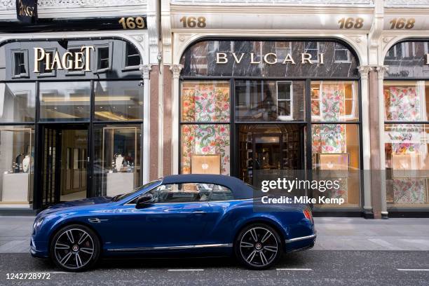 Bentley convertible car parked outside Bvlgari on Bond Street on 24th August 2022 in London, United Kingdom. Bond Street is one of the principal...