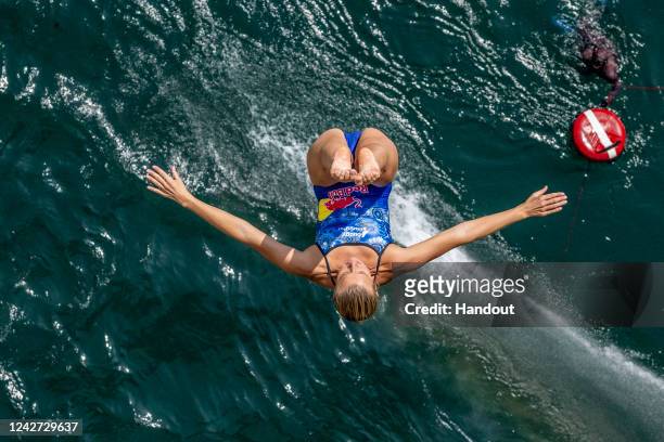 In this handout image provided by Red Bull, Rhiannan Iffland of Australia dives from the 21 metre platform on Stari Most during the second...