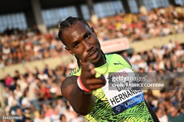 Cuba's Andy Diaz Hernandez celebrates his victory in the men's triple jump event during the Diamond League athletics meeting at Stade Olympique de la...