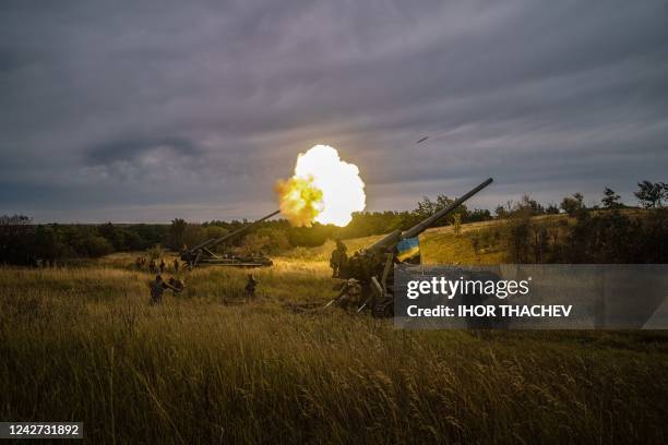 Ukrainian artillery unit fires with a 2S7-Pion, a self-propelled gun, at a position near a frontline in Kharkiv region on August 26 amid the Russian...