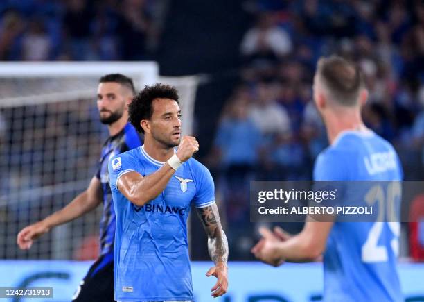 Lazio's brasilian midfielder Felipe Anderson celebrates scoring his team's first goal during the Italian Serie A football match between Lazio and...