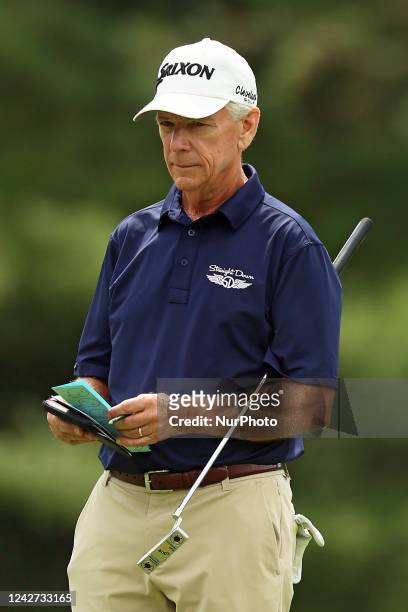 Larry Mize of Columbus, Georgia waits after putting on the sixth green during the first round of The Ally Challenge presented by McLaren at Warwick...