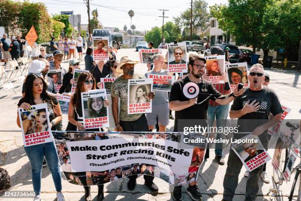 Los Angeles, CA Protestors hold anti-street racing signs during a protest outside the production set of Fast and Furious on Friday, Aug. 26, 2022 in...