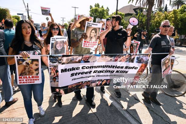 Local residents and supporters of the group Street Racing Kills protest the increase in street takeovers and the latest Fast and Furious movie being...