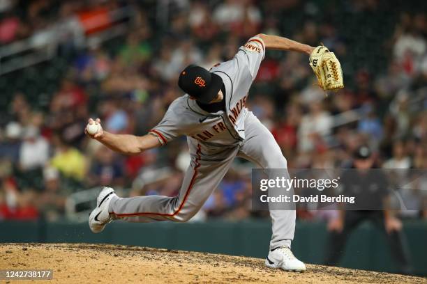 Tyler Rogers of the San Francisco Giants delivers a pitch against the Minnesota Twins in the fifth inning of the game at Target Field on August 26,...