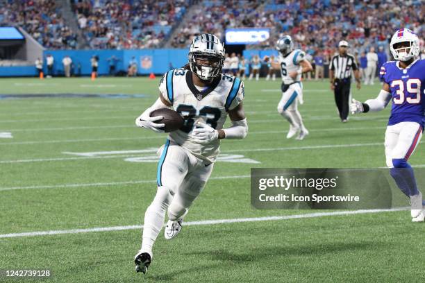 Carolina Panthers running back D'Onta Foreman walks untouched into the end zone for a touch down during a NFL preseason football game between the...