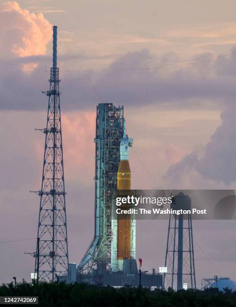 The Artemis I Orion capsule sits atop the Space Launch System rocket on Launch Pad 39B as they prepare for their mission to circle the moon.