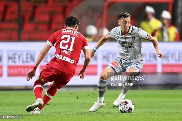 Sam Vines of Royal Antwerp FC, Mesut Ozil of Istanbul Basaksehir during the UEFA Conference League play-off match between Royal Antwerp FC and...
