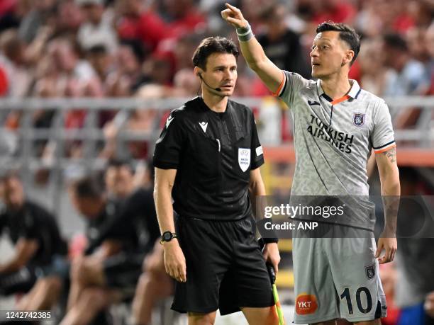 Mesut Ozil of Istanbul Basaksehir gives directions during the UEFA Conference League play-off match between Royal Antwerp FC and Istanbul Basaksehir...