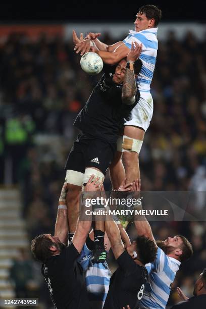 Argentina's Juan Martin Gonzalez fights for possession with New Zealand's Shannon Frizell during the rugby union Test match between New Zealand and...