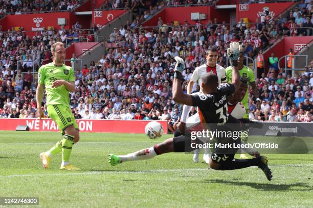 Christian Eriksen of Manchester United sees his shot blocked by the Southampton defence during the Premier League match between Southampton FC and...