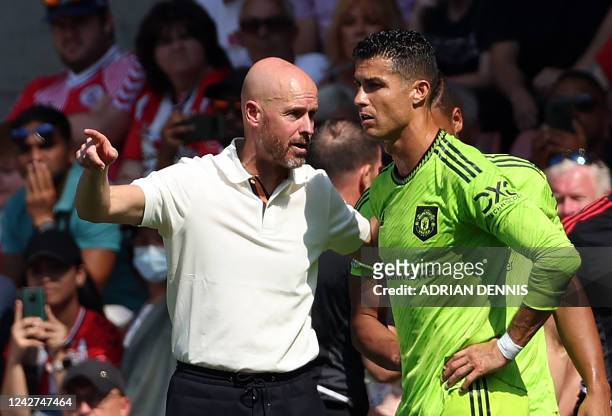 Manchester United's Dutch manager Erik ten Hag directs substitute Manchester United's Portuguese striker Cristiano Ronaldo during the English Premier...