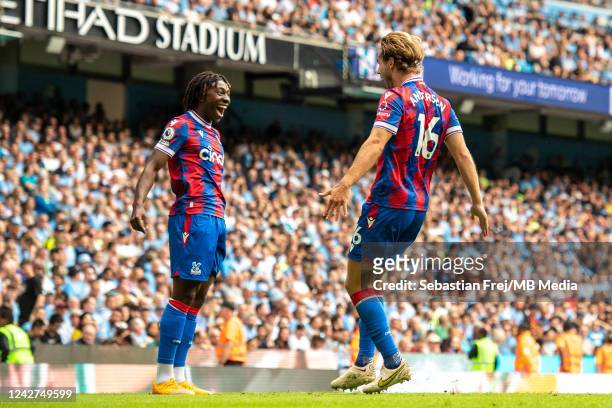 Joachim Andersen of Crystal Palace celebrates with Eberechi Eze after scoring goal during the Premier League match between Manchester City and...