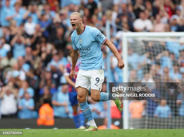 Manchester City's Norwegian striker Erling Haaland celebrates scoring his team's second goal during the English Premier League football match between...