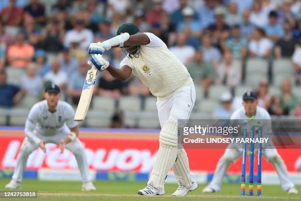 South Africa's Lungi Ngidi is bowled by England's Ollie Robinson as England wrap up the South African tail on day 3 of the second Test match between...