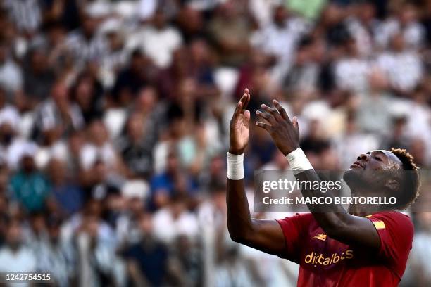 Roma's British forward Tammy Abraham reacts after missing a goal opportunity during the Italian Serie A football match between Juventus and AS Roma...