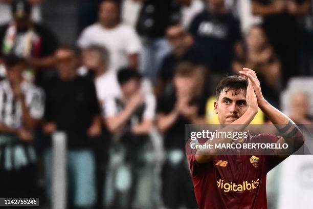 Roma's Argentinian forward Paulo Dybala acknowledges the public as he leaves the pitch to be substituted during the Italian Serie A football match...