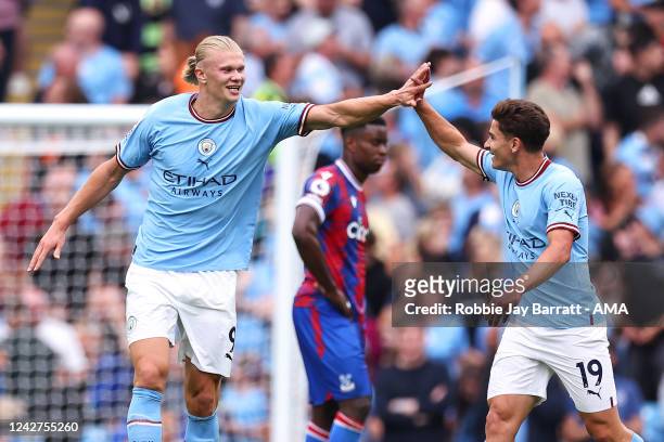 Erling Haaland of Manchester City celebrates after scoring a goal to make it 3-2 during the Premier League match between Manchester City and Crystal...