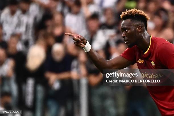 Roma's British forward Tammy Abraham celebrates after scoring an equalizer during the Italian Serie A football match between Juventus and AS Roma on...