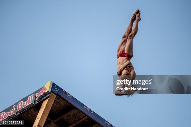 In this handout image provided by Red Bull, Gary Hunt of France dives from the 27 metre platform on Stari Most during the final competition day of...